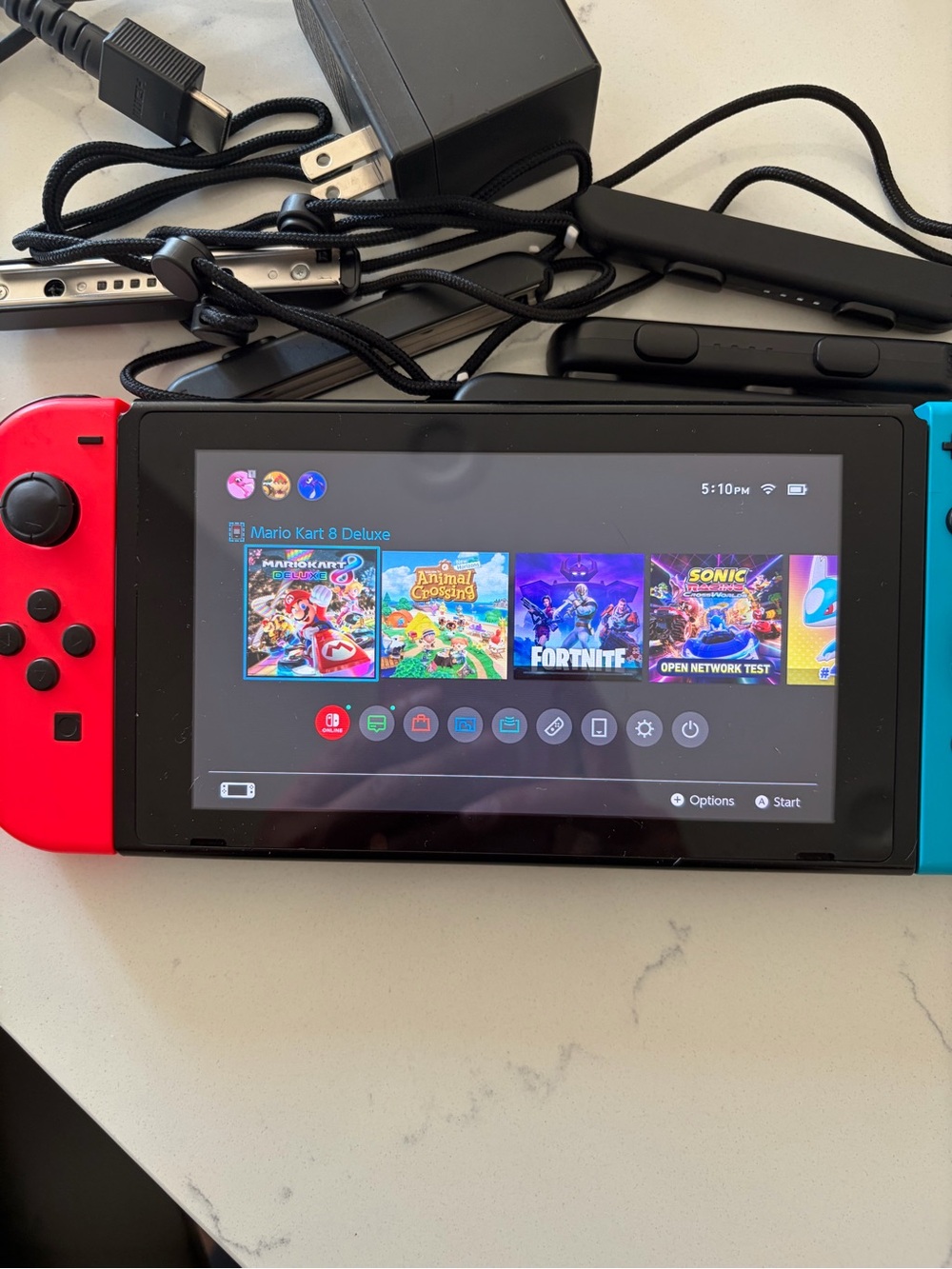 Nintendo Switch with Red Left and Blue Right Joy‑Con